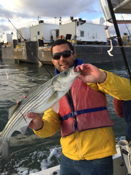 Dylan with a Striper from New York Harbour